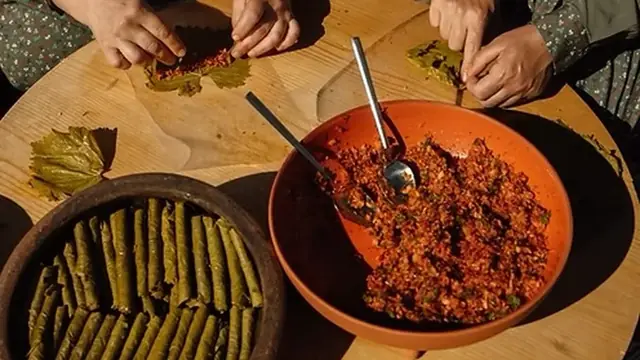 Local cooking experience preparing stuffed vine leaves in Cappadocia