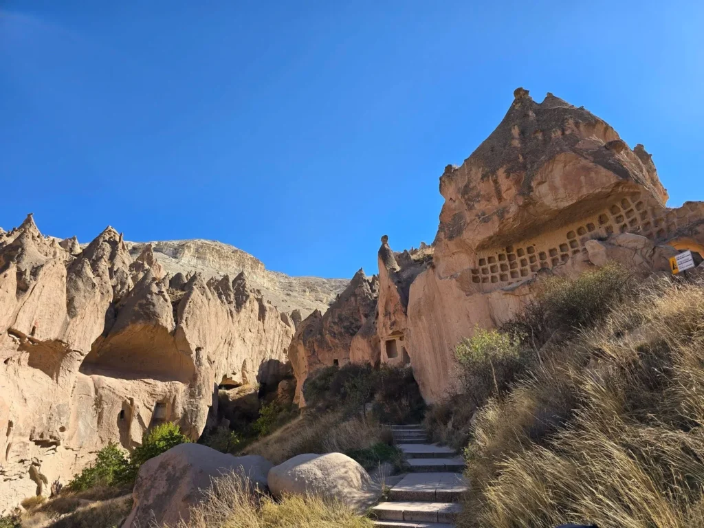 Rock formations with carved pigeon openings in Cappadocia